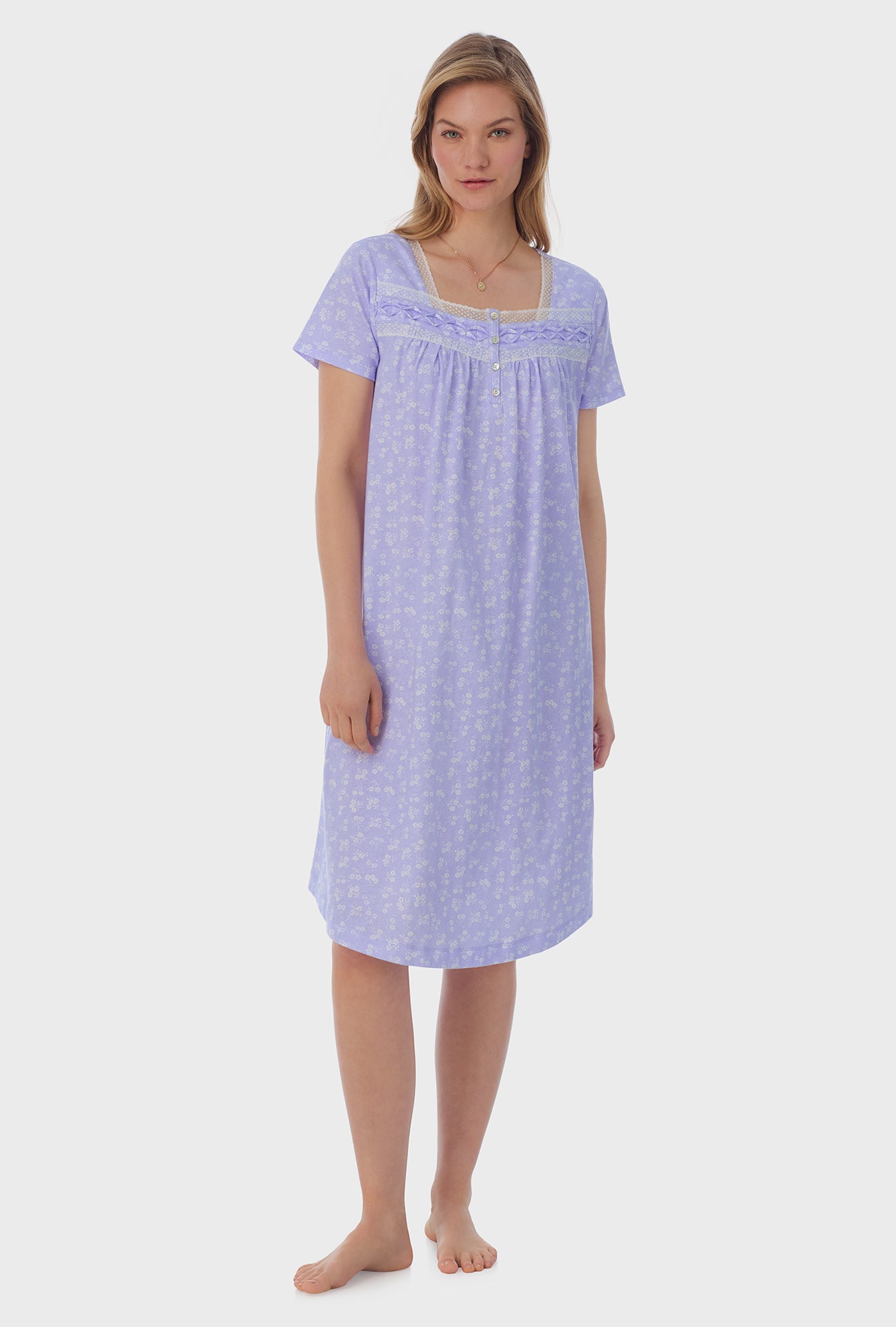 A lady wearing purple short Sleeve Cotton Waltz Nightgown with Sweet Ditsy print