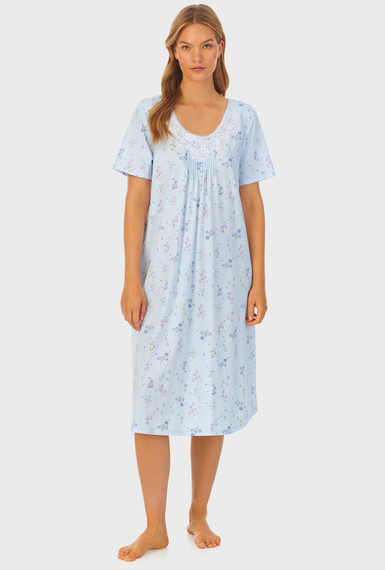 A lady wearing Cotton Waltz Nightgown with Spring Floral print