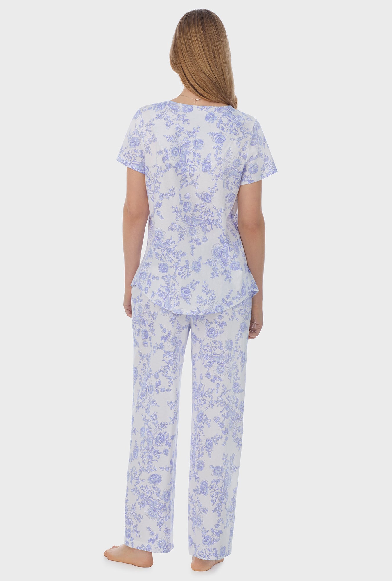 A lady wearing white short Sleeve Cotton Capri Pajama Set with Vintage Rose  print