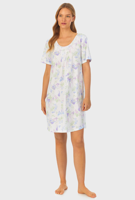 A lady wearing Cotton Short Nightgown with Butterfly Garden print