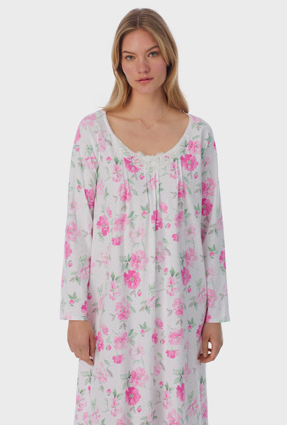 A lady wearing long sleeve Cotton Waltz Nightgown with Dream Garden print  