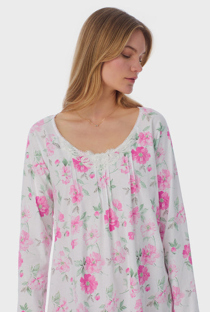 A lady wearing long sleeve Cotton Waltz Nightgown with Dream Garden print  