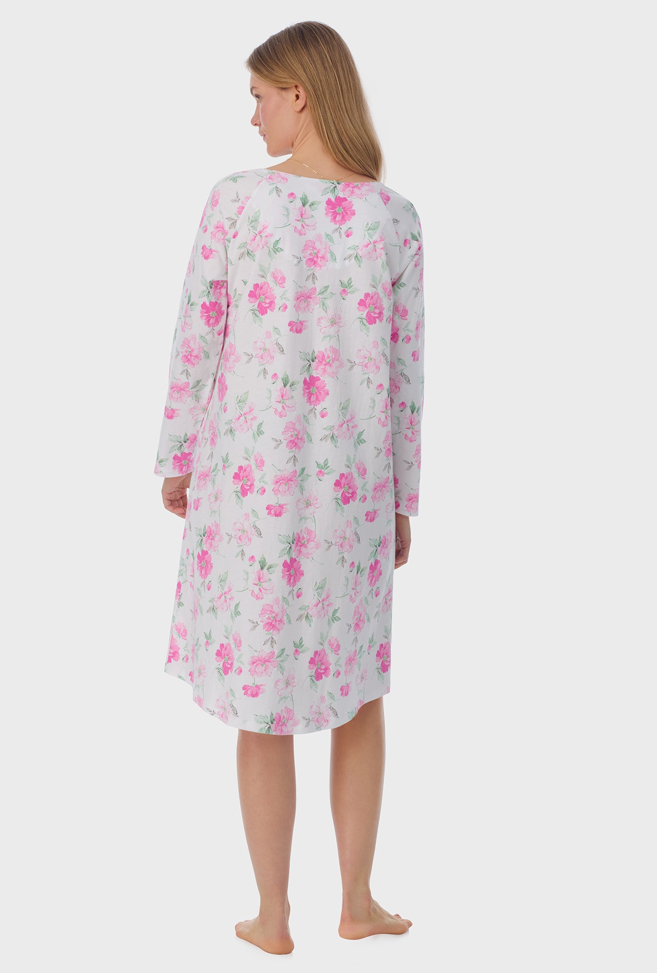 A lady wearing long sleeve Cotton Waltz Nightgown with Dream Garden print  