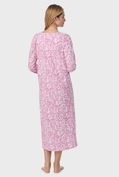 A lady wearing ballet nightgown with berry paisley print