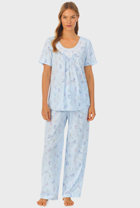 A lady wearing cotton long pajama set with Spring Floral print