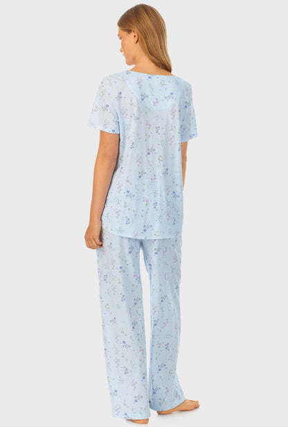 A lady wearing cotton long pajama set with Spring Floral print