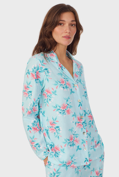 A lady wearing Blooming Lily Cotton Long Pajama Set