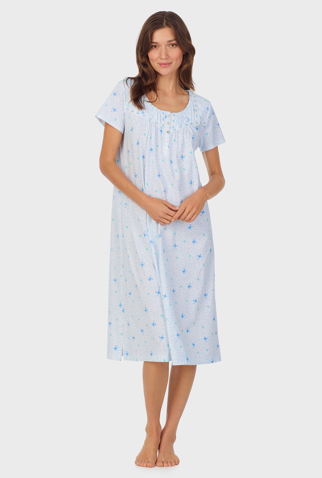 A lady wearing Blue Hummingbird Cotton Waltz Nightgown