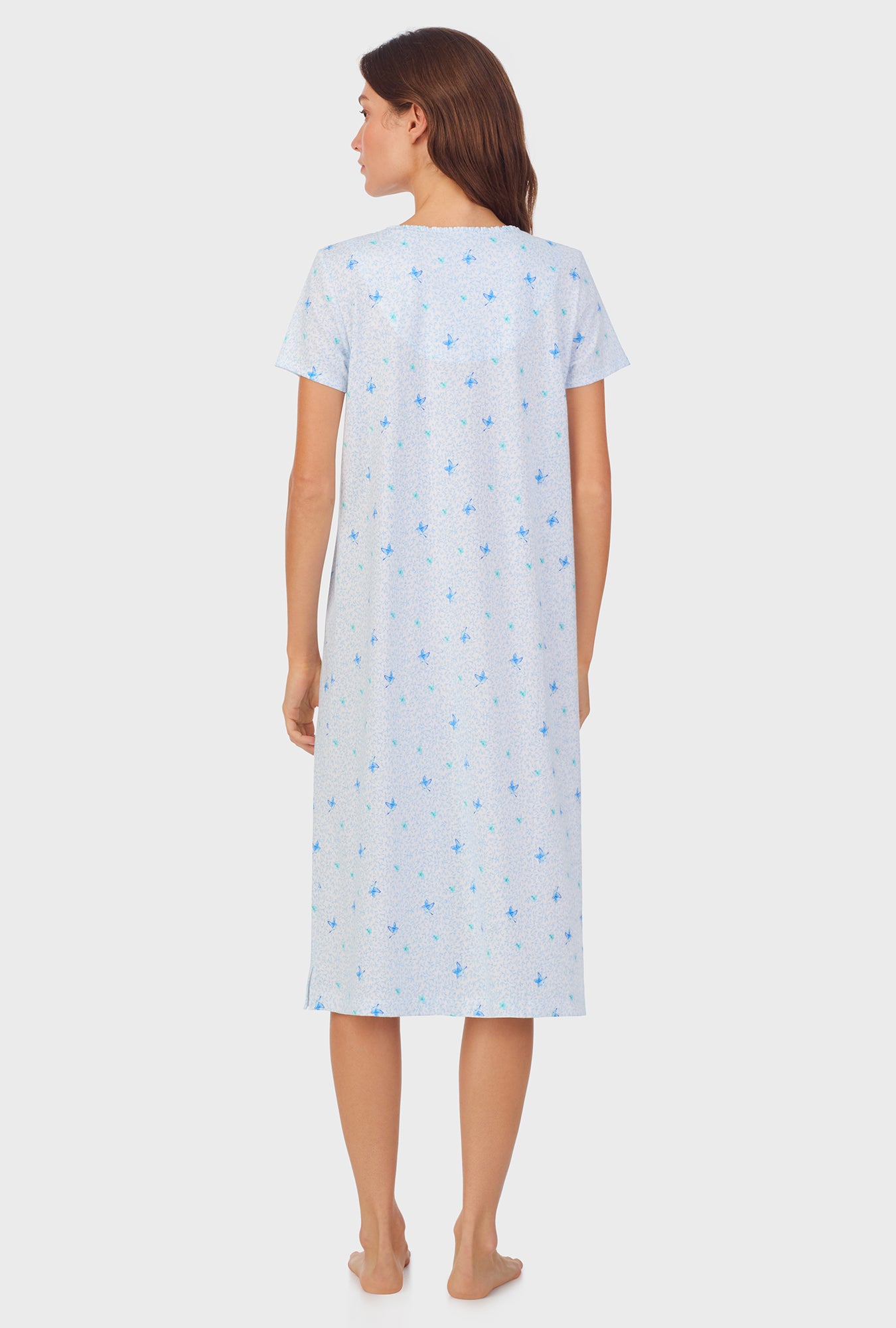 A lady wearing Blue Hummingbird Cotton Waltz Nightgown