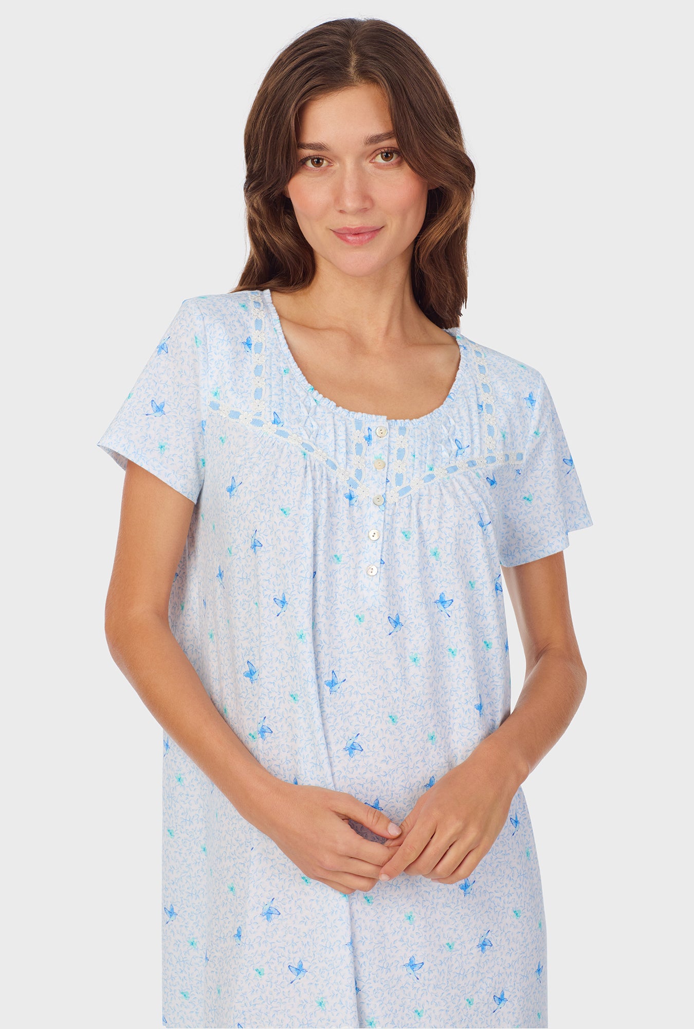 A lady wearing Blue Hummingbird Cotton Waltz Nightgown