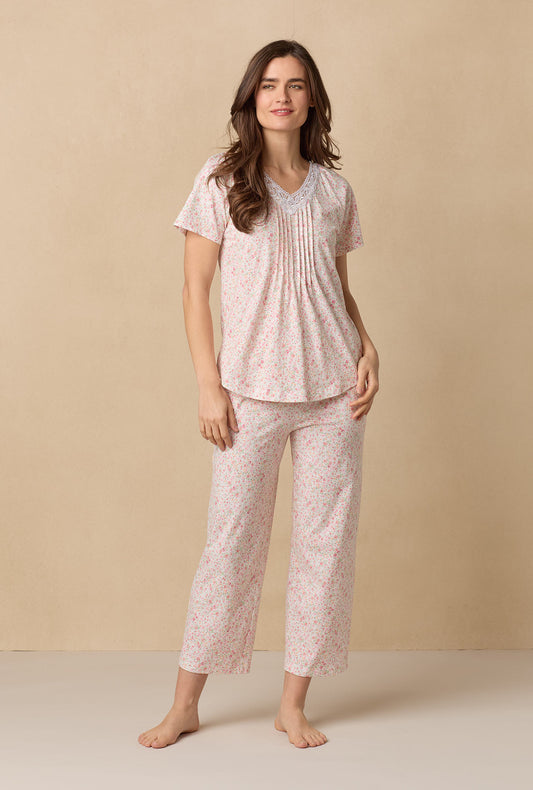 A lady wearing Meadow Floral Capri Cotton Knit Pajama Set