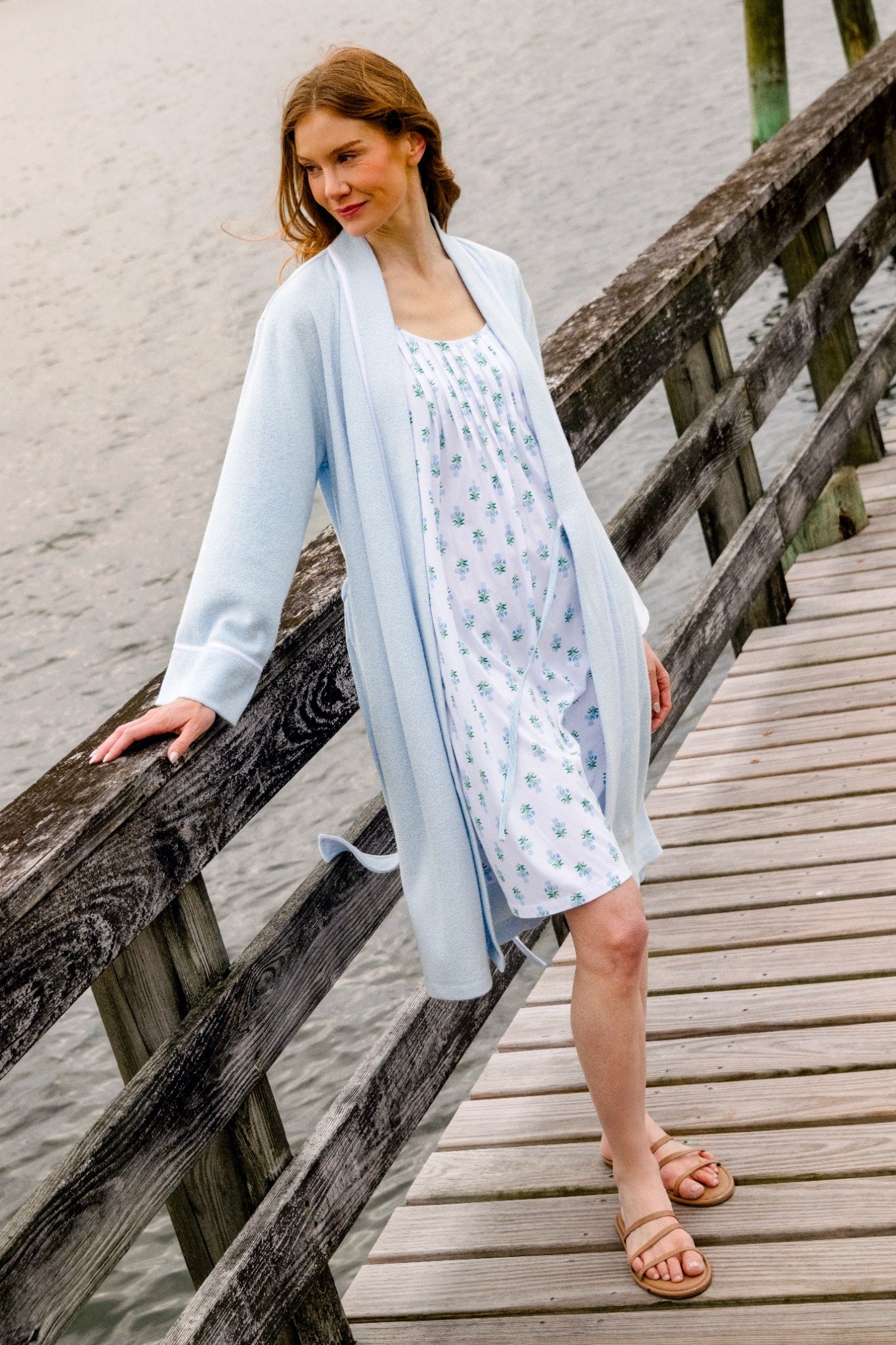 A lady wearing Cashmere Blue Terry Wrap Waltz Robe
