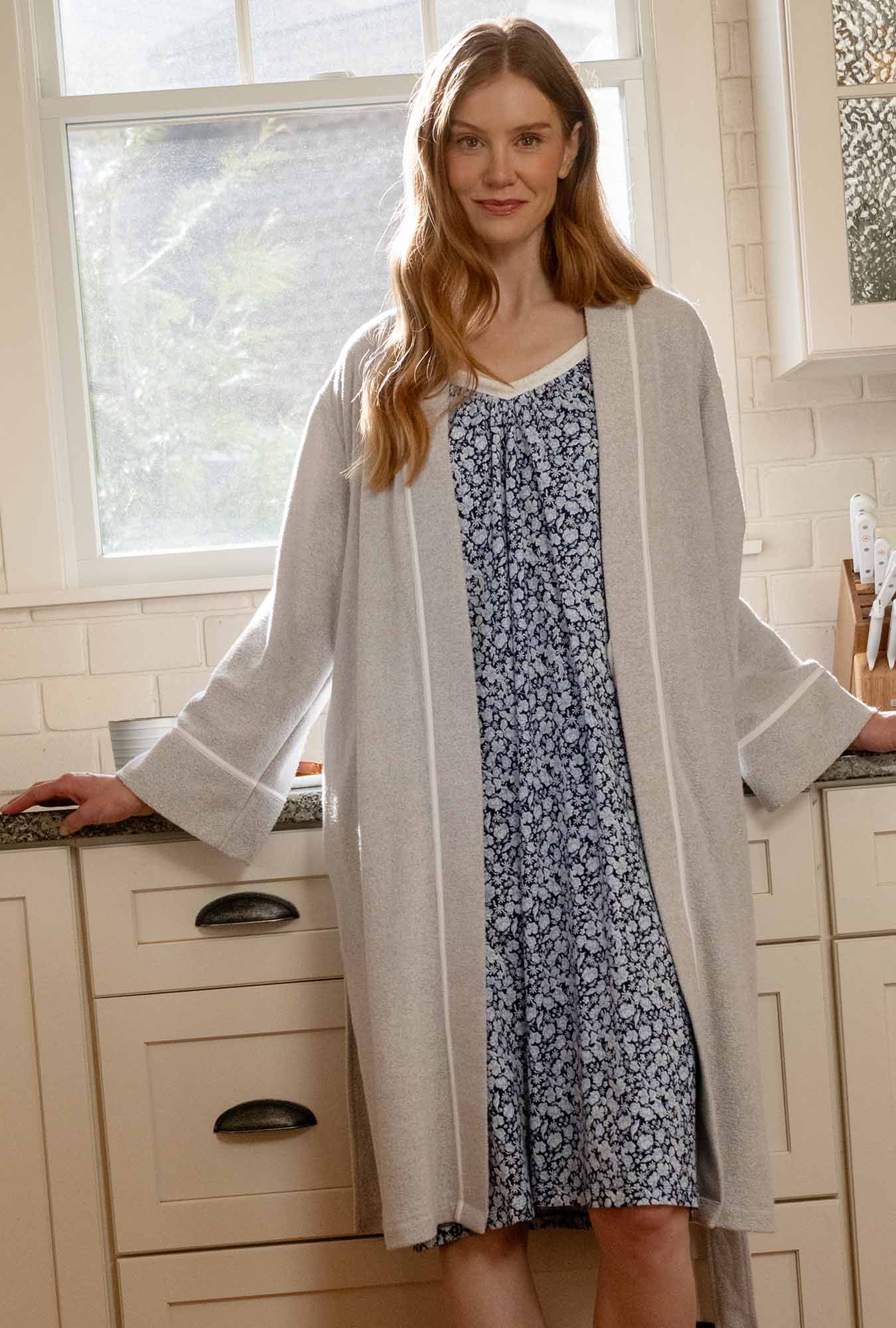 A lady wearing Blue Depths Floral Cotton Waltz Chemise