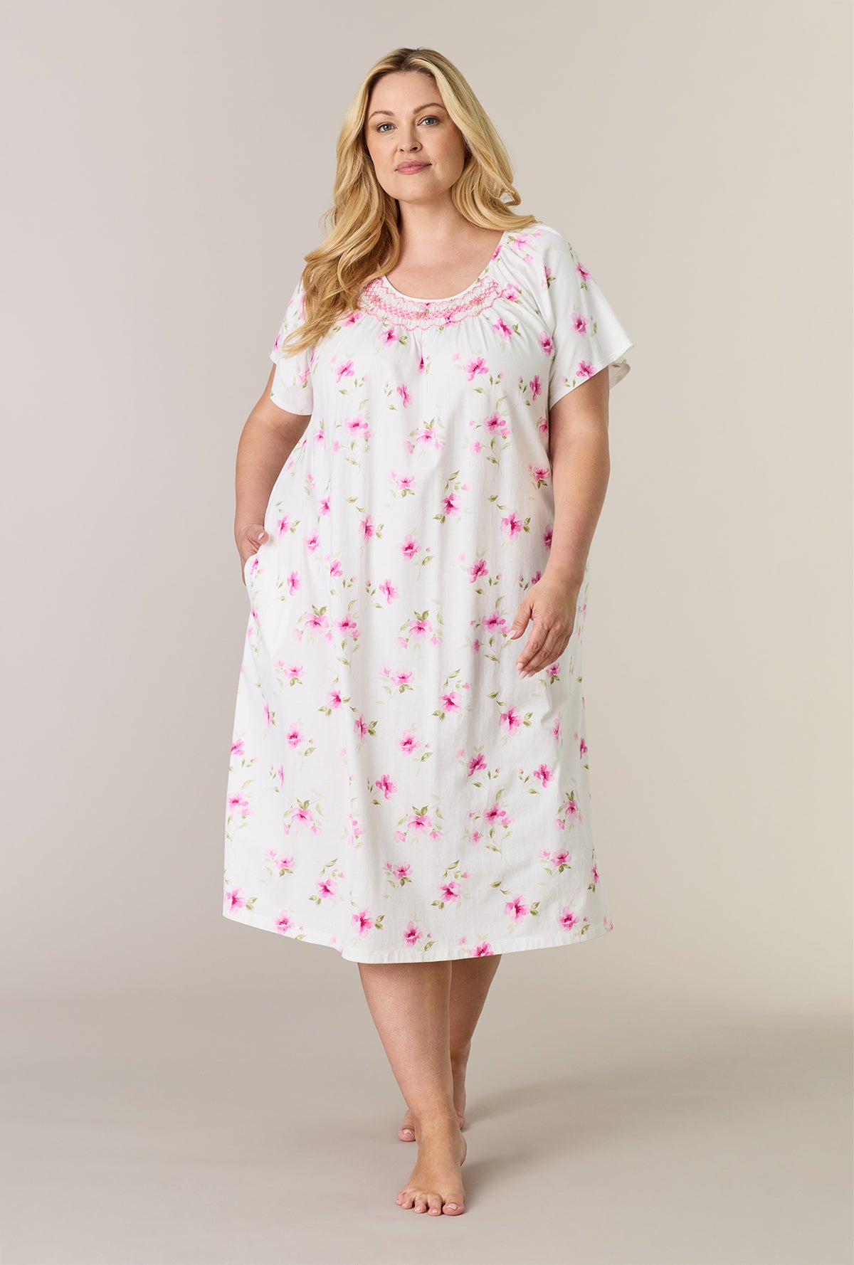 A lady wearing plus size Blush Garden Cotton Midi Nightgown 