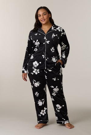 A lady wearing plus size Midnight Blossom Stretch Velour Notch Collar Long Pajama Set