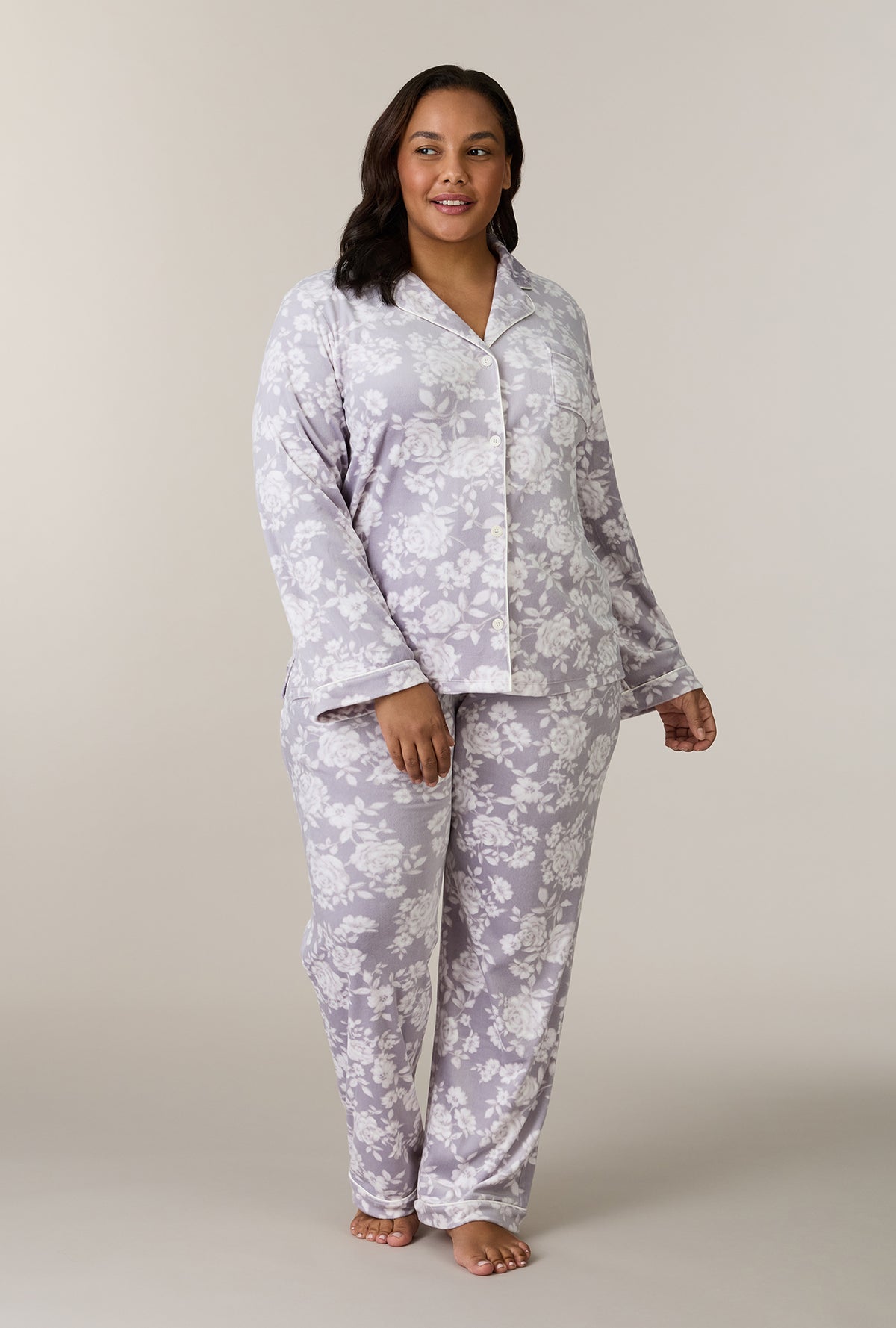 A lady wearing plus size Winter Bouquet Stretch Velour Notch Collar Long Pajama Set