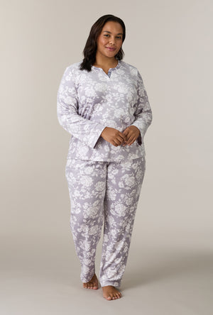 A lady wearing plus size Winter Bouquet Stretch Velour Long Pajama Set