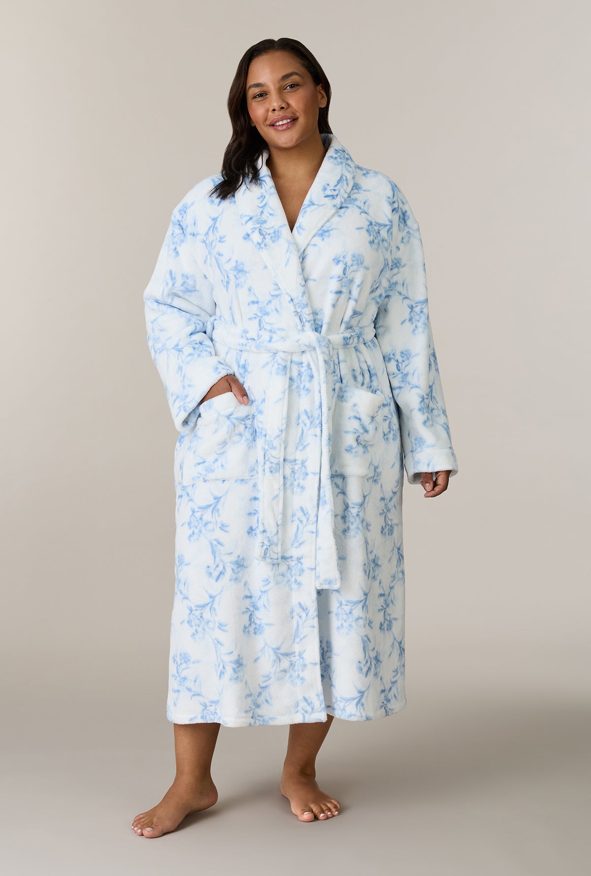 A lady wearing plus size Winter Blue Floral Wrap Chenille Ballet Robe