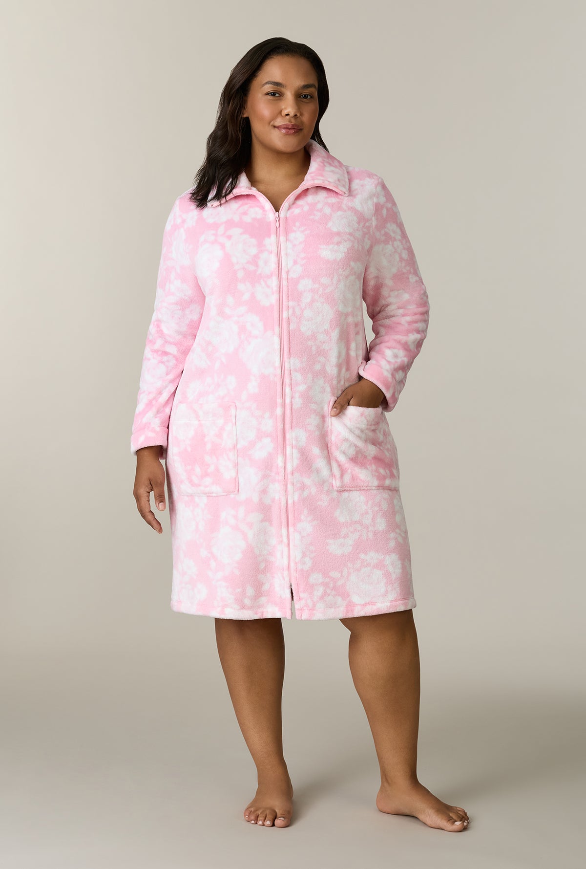 A lady wearing plus size Pink Peonies Chenille Short Zip Robe