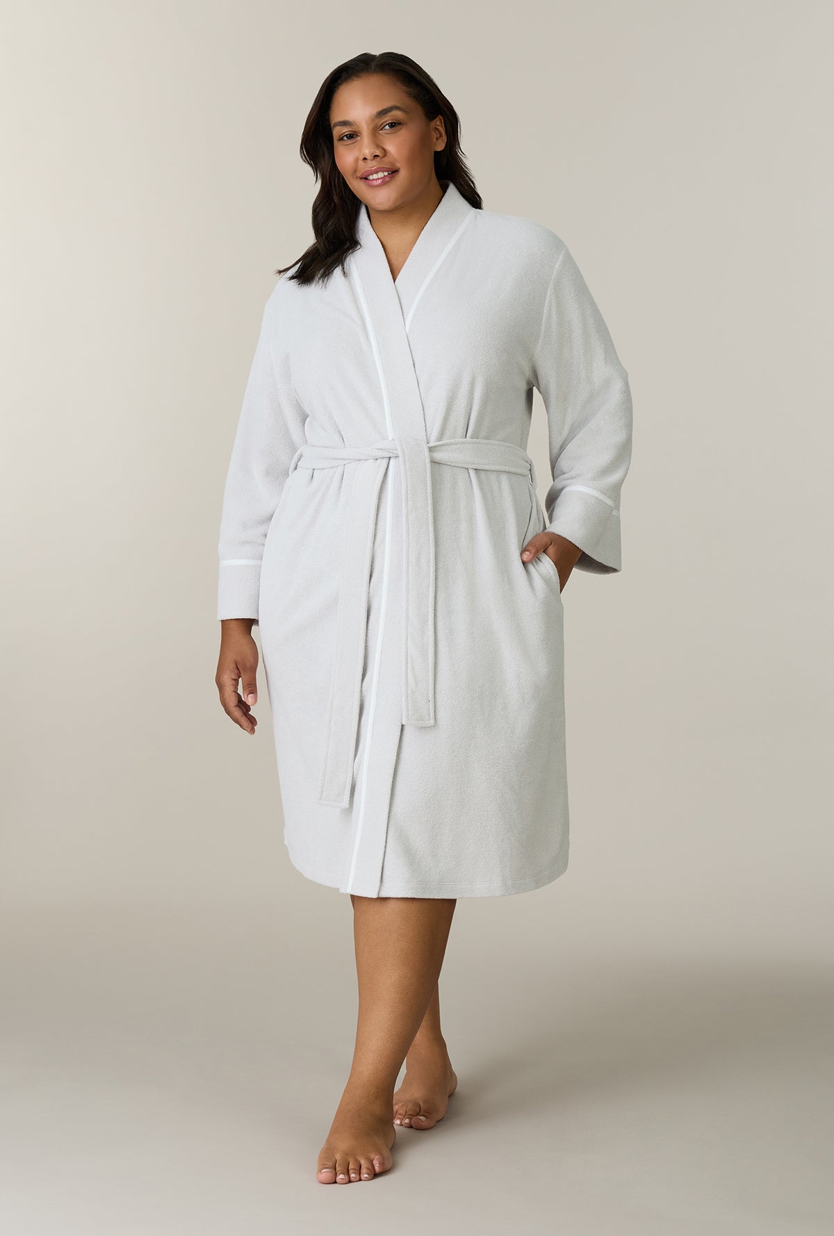 A lady wearing plus size Lunar Rock Terry Wrap Waltz Robe