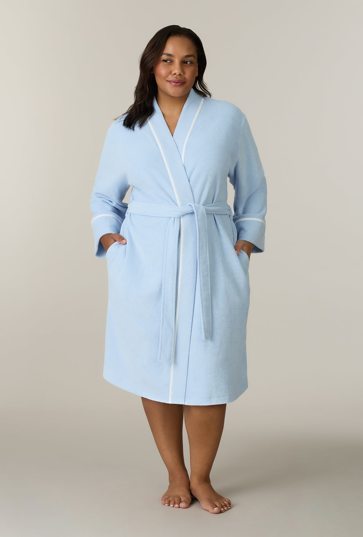 A lady wearing plus size Cashmere Blue Terry Wrap Waltz Robe