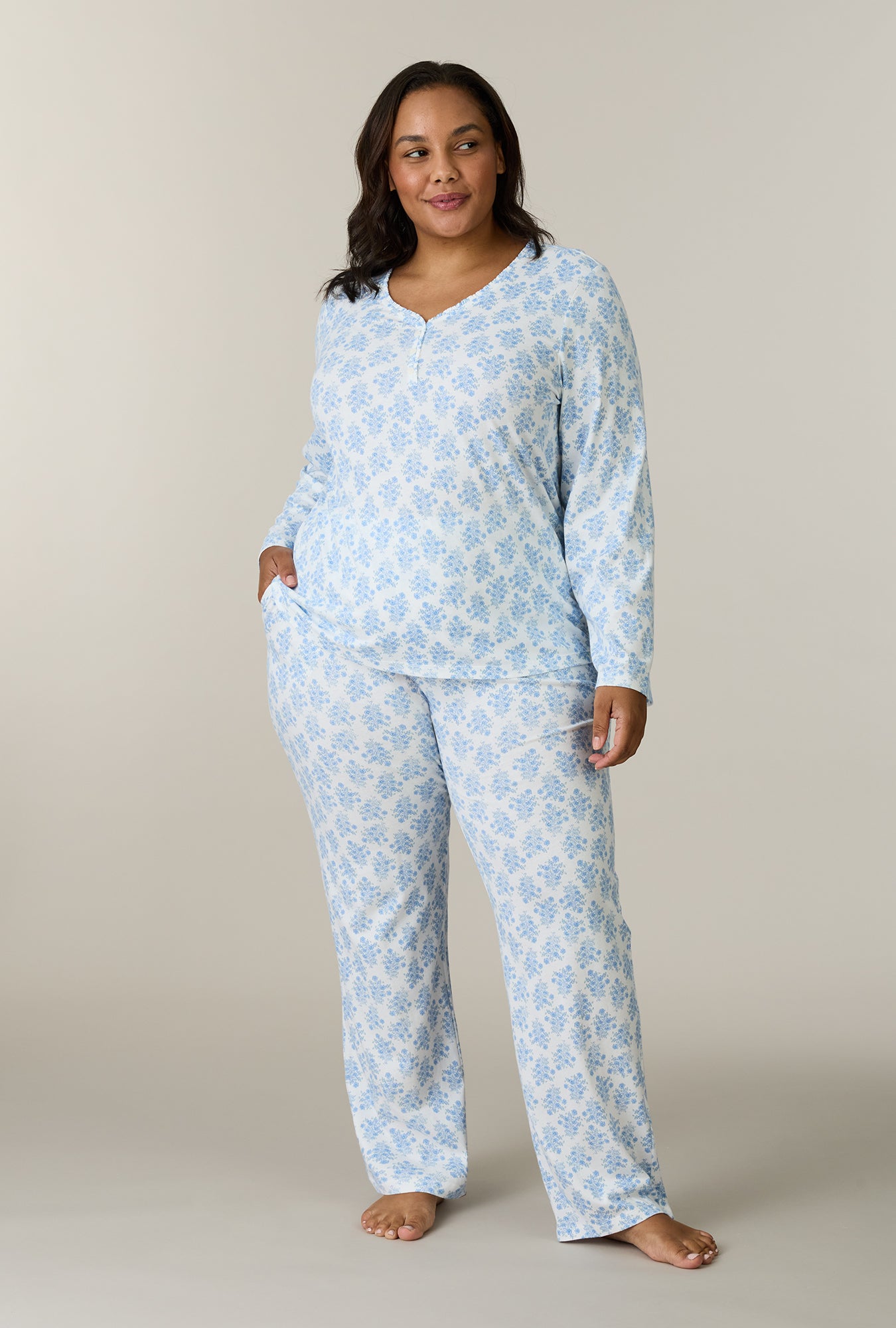 A lady wearing plus size Hertiage Bouquet Cotton Long Pajama Set