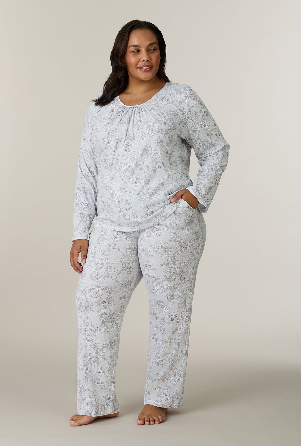 A lady wearing plus size Whisper Garden Cotton Long Pajama Set