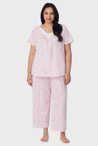 A lady wearing Pink Butterfly Cotton Capri plus Pajama Set