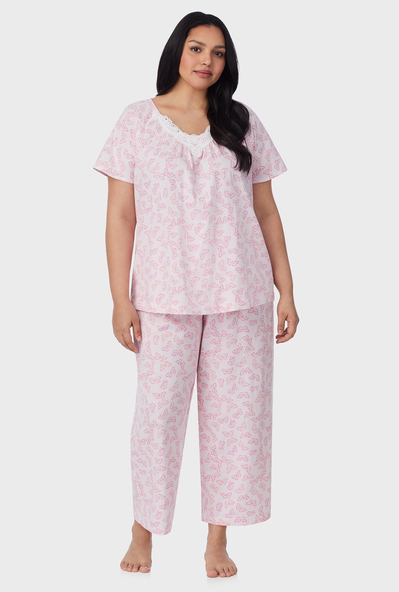 A lady wearing Pink Butterfly Cotton Capri plus Pajama Set