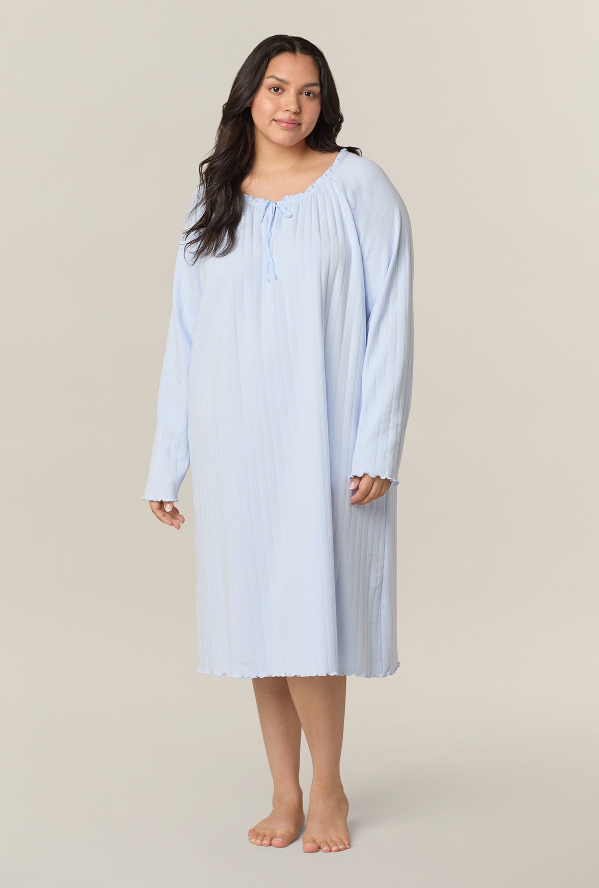 A lady wearing Sweet Blue Cotton Pointelle Waltz plus size Nightgown
