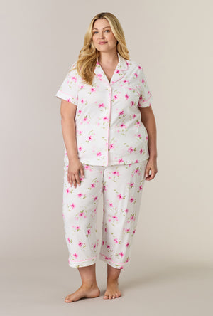 A lady wearing plus size Blush Garden Cotton Notch Collar Capri Pajama Set