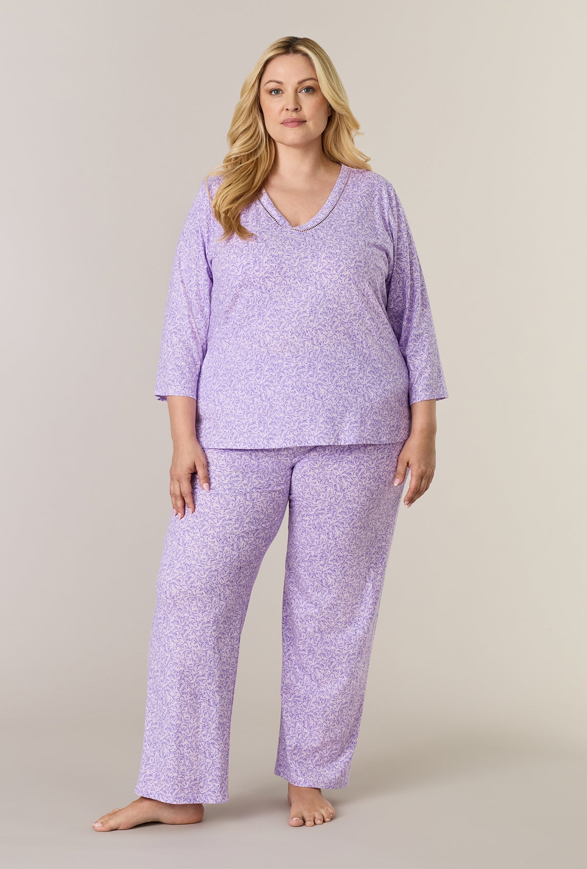 A lady wearing plus size Lavendar Meadow Cotton Long Pajama Set