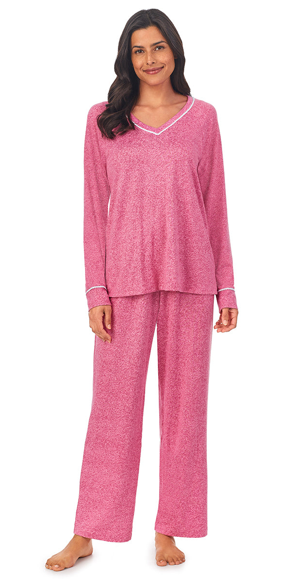 A lady wearing a rose heather long sleeve pajama set.