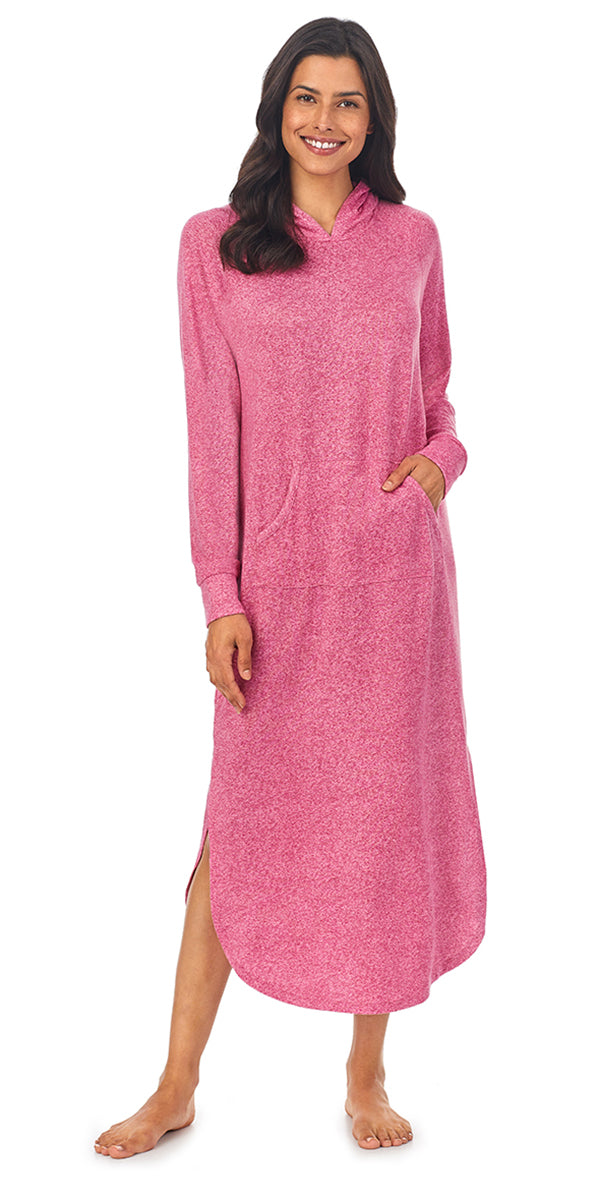 A lady wearing a rose heather long sleeve long nightshirt.